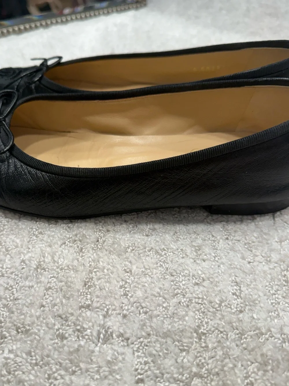 CHANEL Black Leather Ballerinas with Patent Cap-Toe